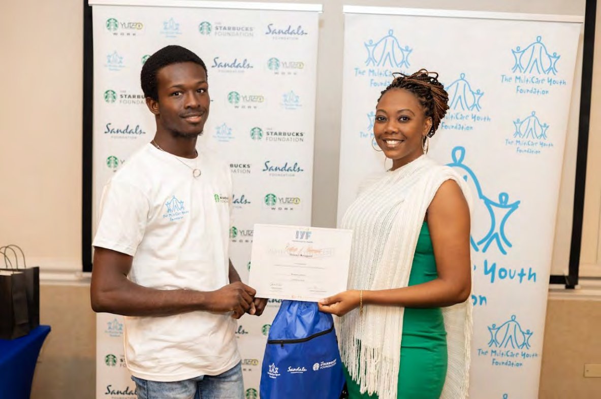 Duwan McTaggart receives his Passport to Success certificate